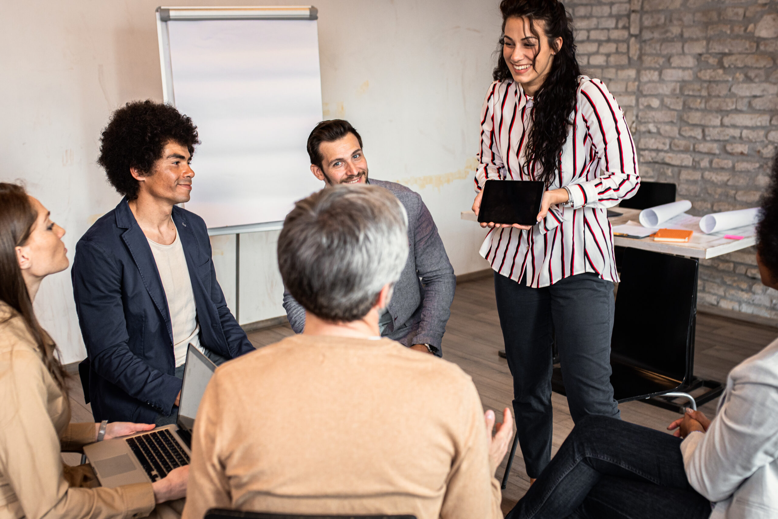 Group of diverse group of business people having a meeting while